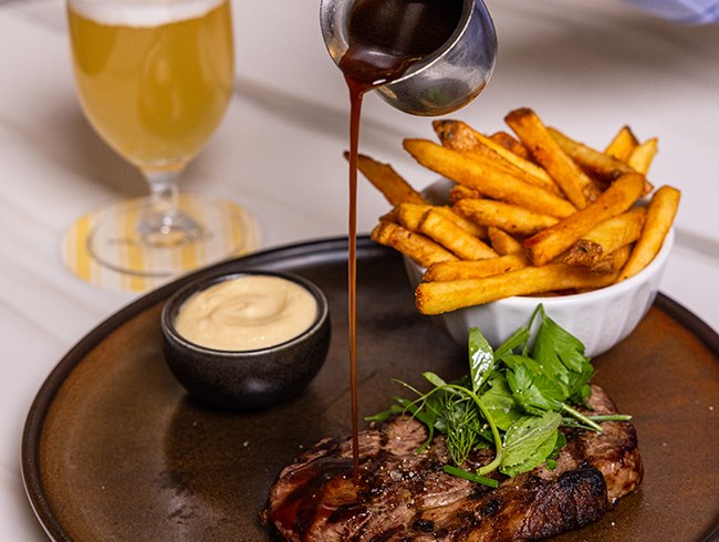 Steak & Unlimited Frites with a Beer