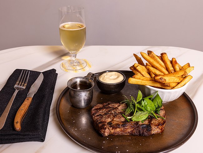 Steak & Unlimited Frites with a Beer